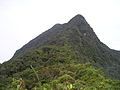 The peak of Mount Korbu, the tallest mountain of the range.