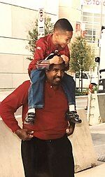 Dennis Green with his son in 2004